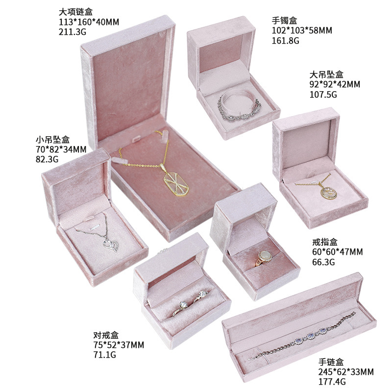 A box full of velvet rings, a box full of jewels, a box full of pearl necklaces.