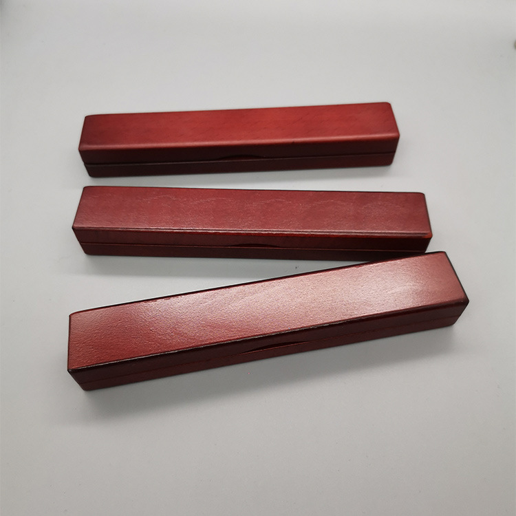 A wooden pen box with a croquette set of printed logo metal croquette plastics designed for students with environmentally friendly piping