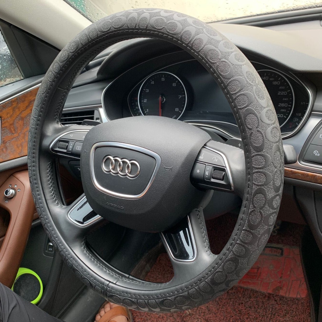 The truck's steering wheel is a leather-pumper.