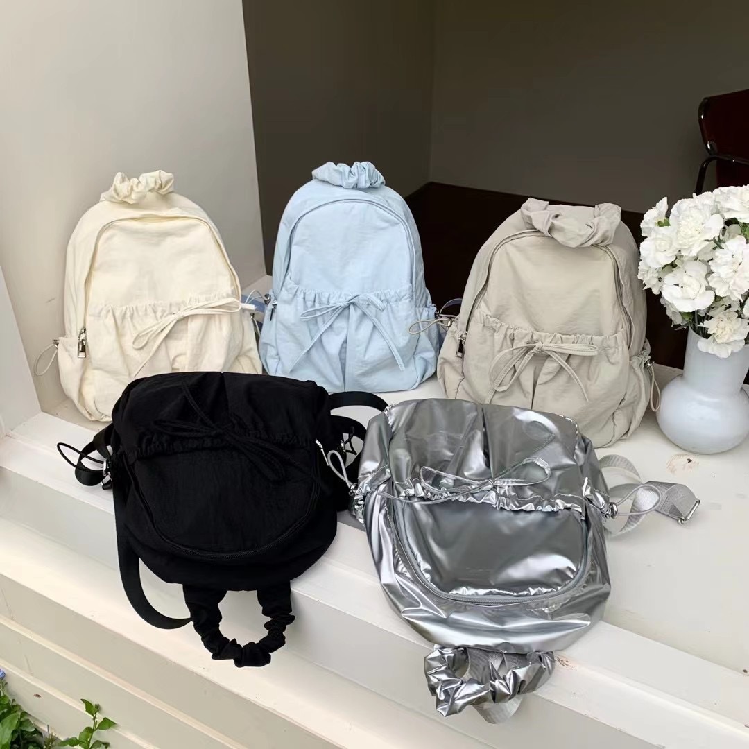 The new 2024 Korean mini-Nilong double-shouldered outdoor backpacks lightened up with a big-capacity student bag.