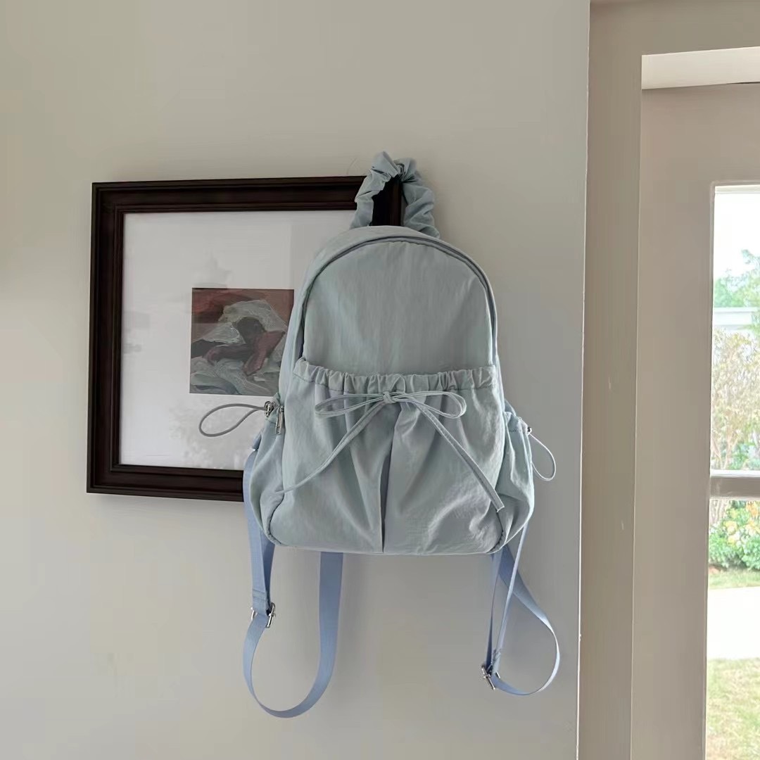 The new 2024 Korean mini-Nilong double-shouldered outdoor backpacks lightened up with a big-capacity student bag.