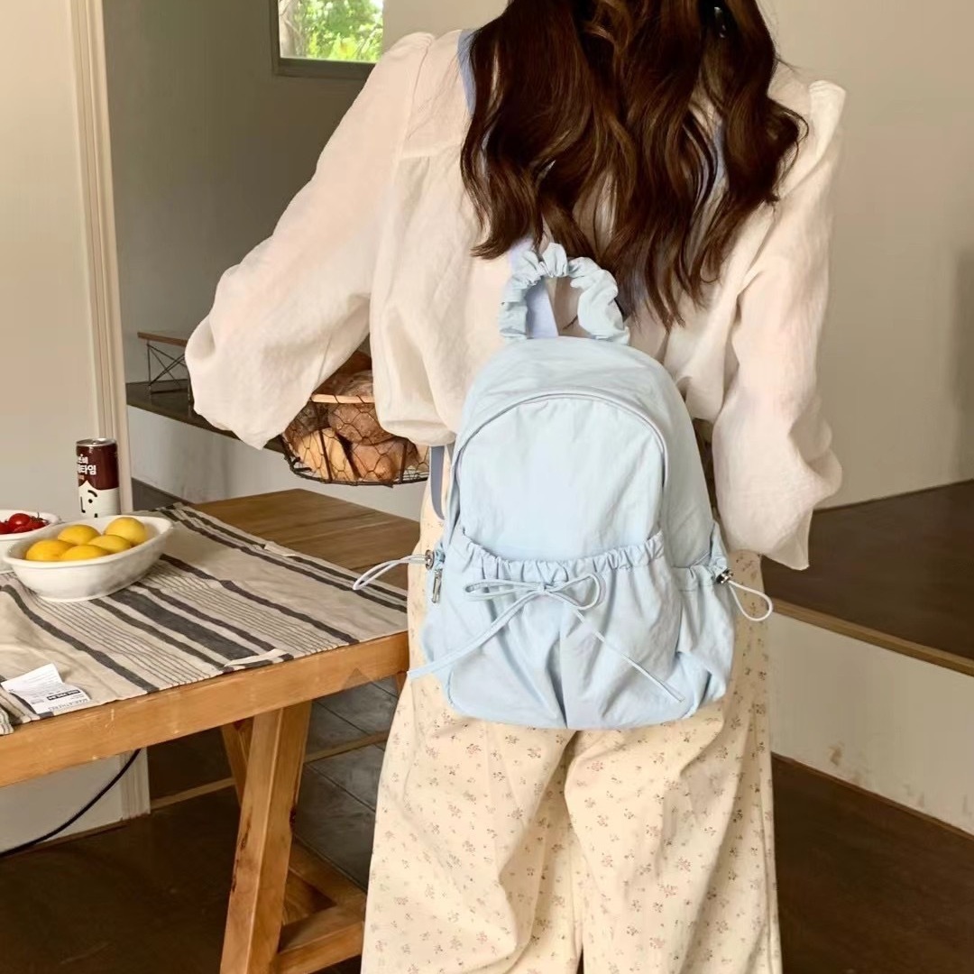 The new 2024 Korean mini-Nilong double-shouldered outdoor backpacks lightened up with a big-capacity student bag.