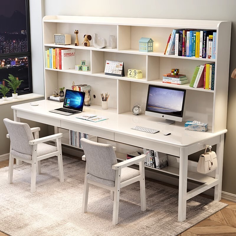 Miniki's two-person desk set-up for children's learning table with multiple teams of primary-schoolers with long tables