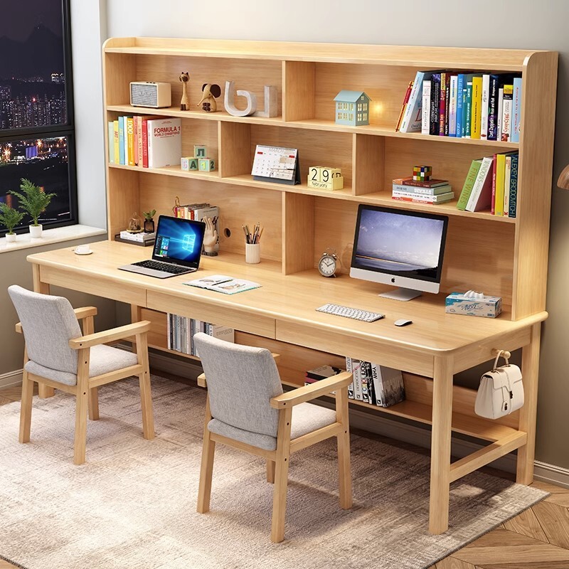 Miniki's two-person desk set-up for children's learning table with multiple teams of primary-schoolers with long tables