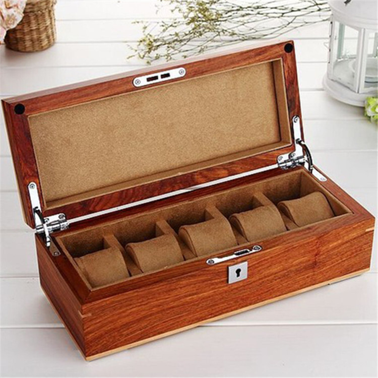 Six leather watch boxes, a wristwatch, a mechanical watch box, and a watch box.