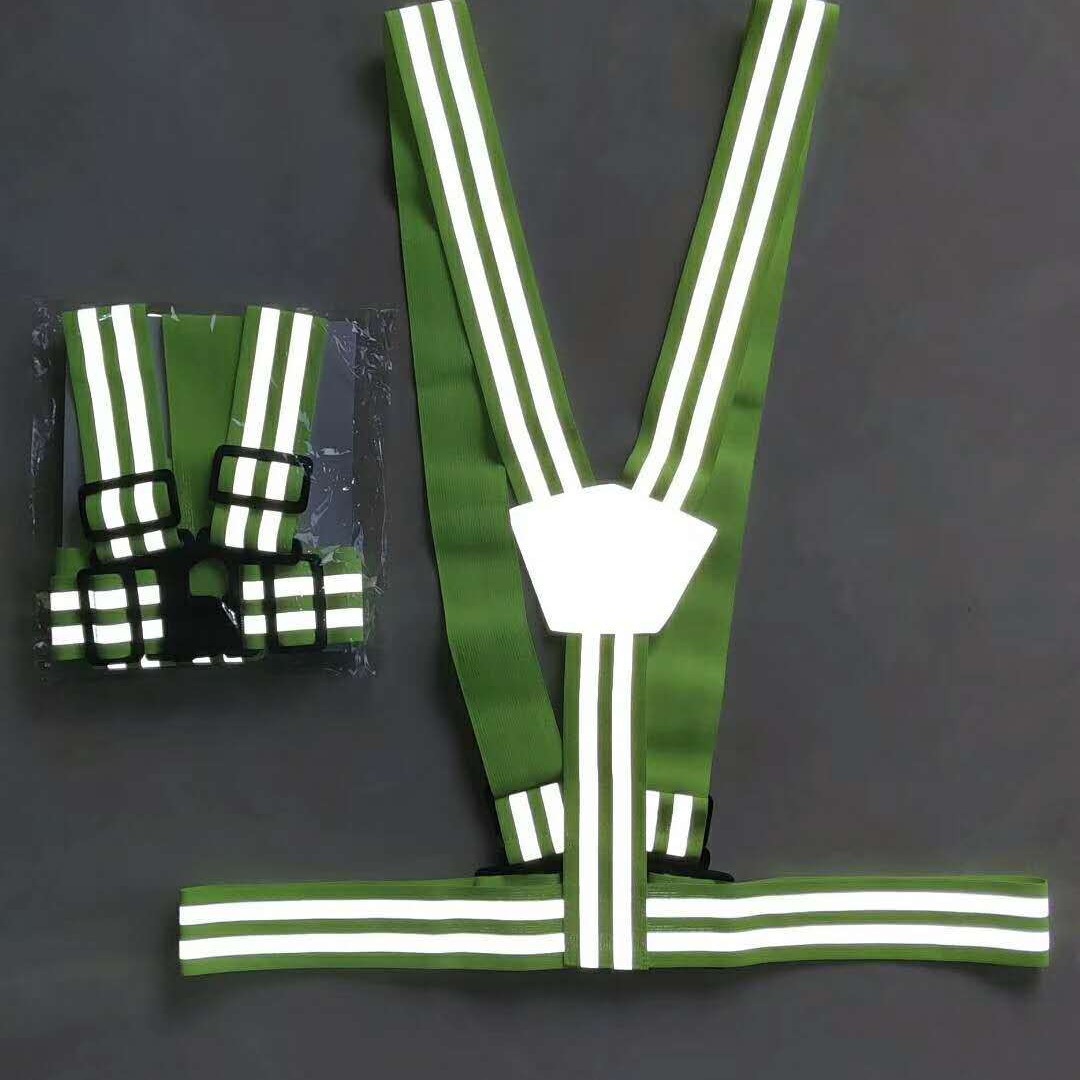 An adult child's outdoor retrospect belt is loose enough to carry a retrospect vest and ride a vest around the shoulder at night