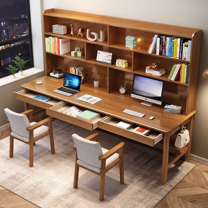 Miniki's two-person desk set-up for children's learning table with multiple teams of primary-schoolers with long tables