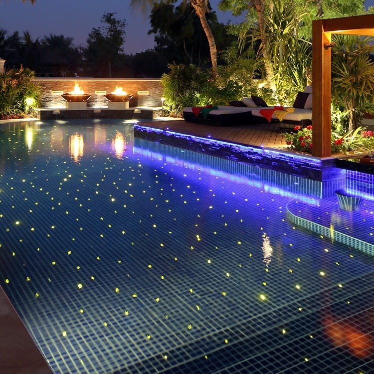 Underwater with stars glowing in the pool, fiber-optic guidance in the pool with stars under the surface, light separation technology.