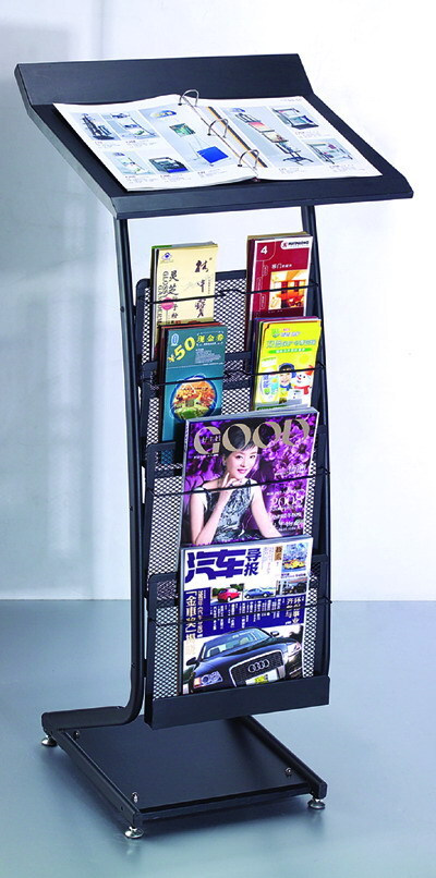 Foreground of advertising materials at the front door and display of book collections in newspapers and magazines