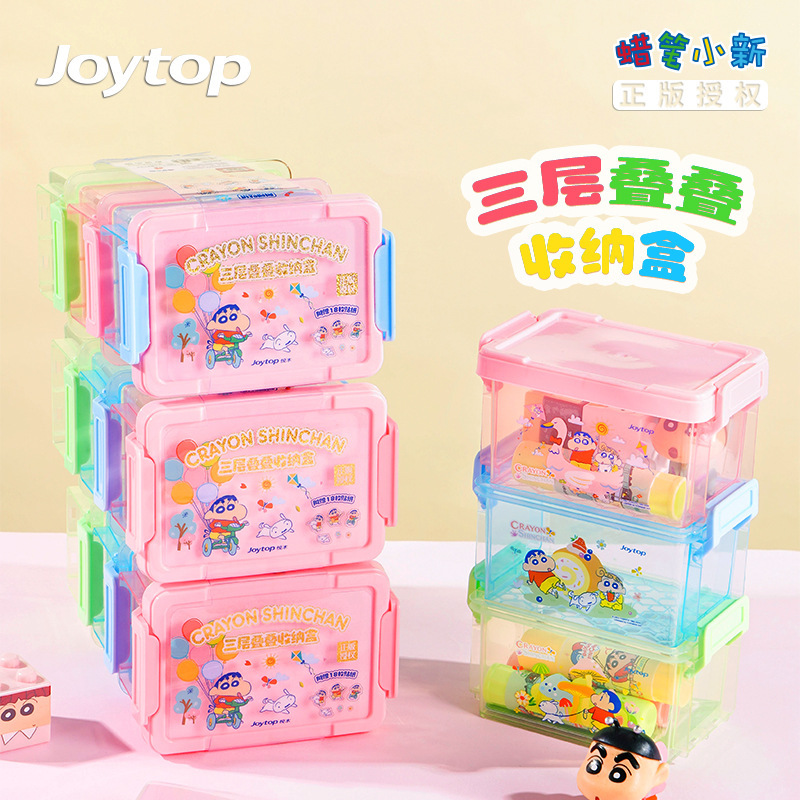 Một chiếc hộp mê tín ba tầng mới với một bản sao của cái nhãn mới trên bàn.