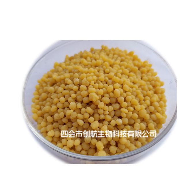 Direct sale to a plant with a yellow coloured fertilizer pigmented with a slow release of the fertilizer.