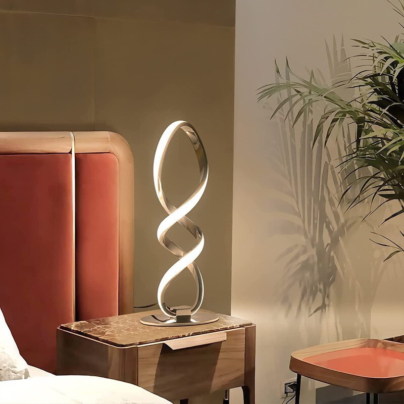 A very simple silver LED lamp, a modern light luxurious bedroom bed, allows remote lighting of home-decorated desktop lamps in the living room