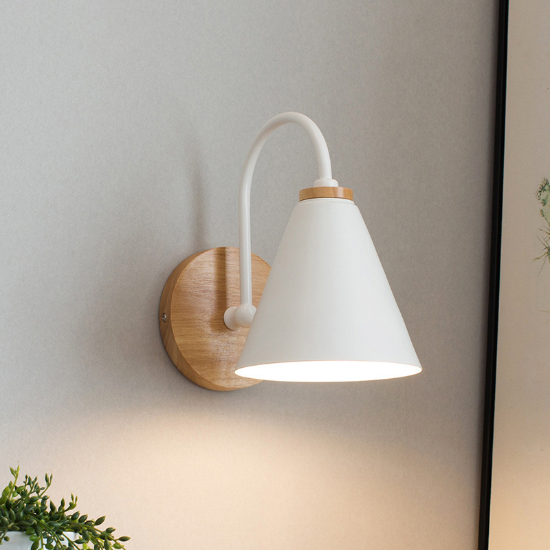 Black and white light on the bedside of the Nordic bedroom.