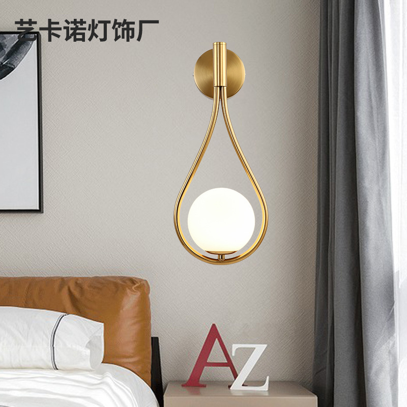 Post-simplified modern creative bedroom bedside headlamps across the corridor, light luxurious background wall hotel wall.