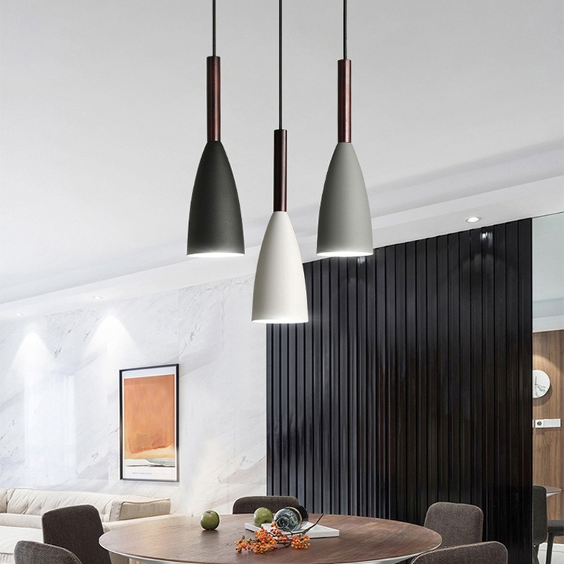 Nordic dining room lights are about the size of a small chandelier with a black-and-white restaurant lamp in a single, modern home.