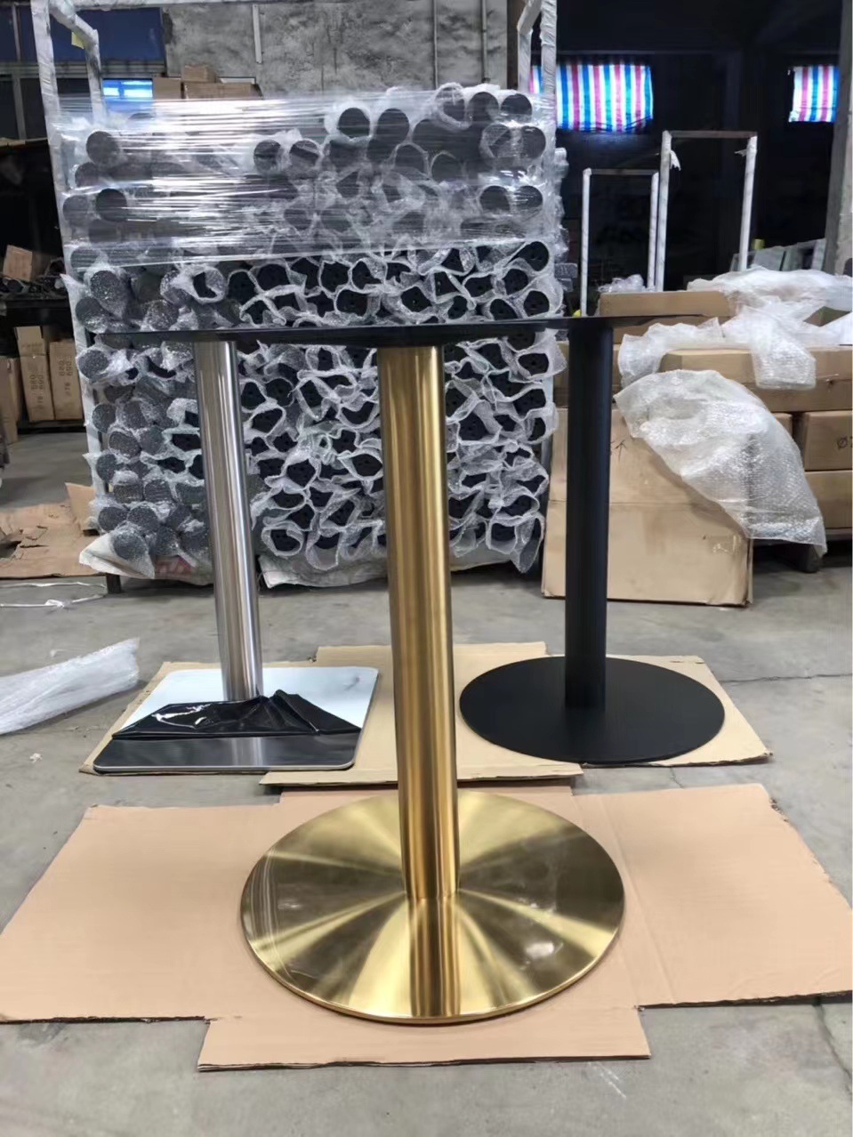 Two-person table-top table with a table full of gold for the foot of the mill's stainless steel-laced table.