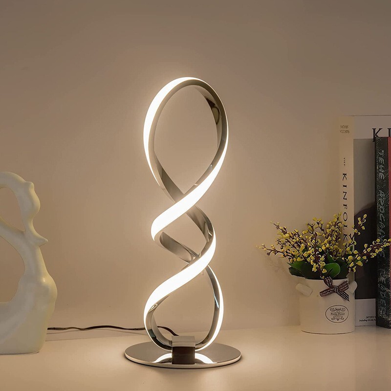 A very simple silver LED lamp, a modern light luxurious bedroom bed, allows remote lighting of home-decorated desktop lamps in the living room