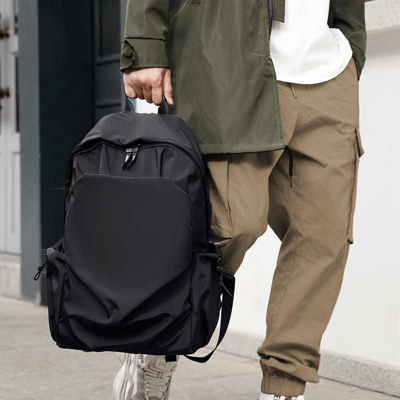 Cross-border new two-shoulder-packed fashionable male computer bag with a short, approximately large capacity package customised for USB backpacks