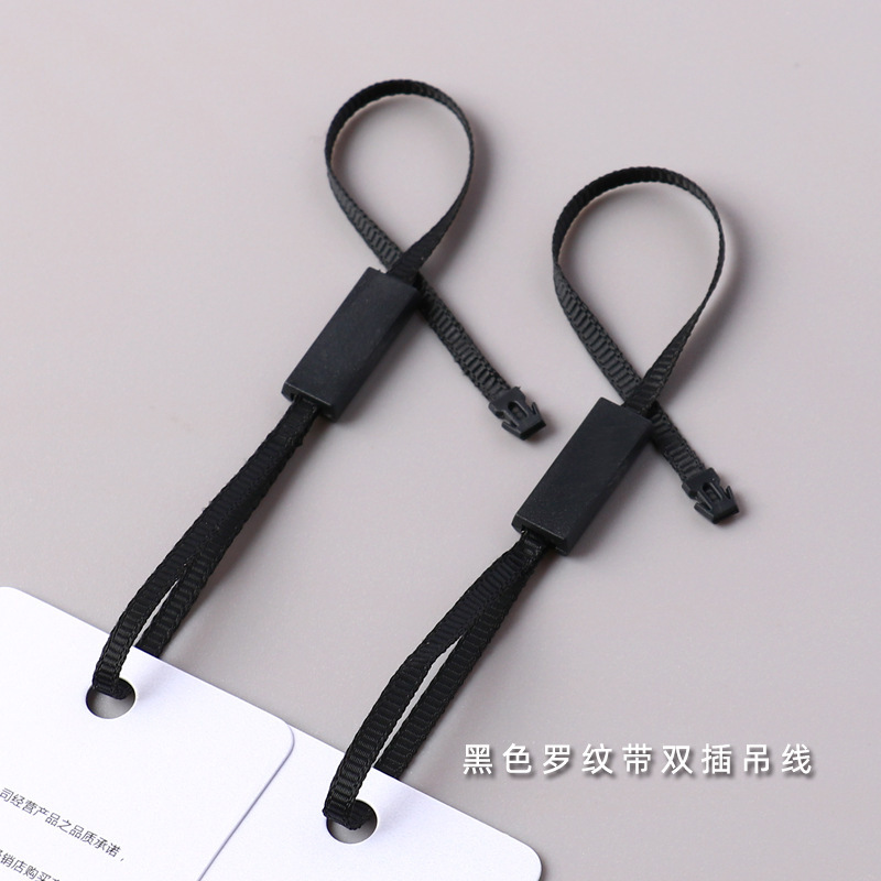 Two tweaked tweezers can be made of a logo-free, spotted, generic hanger line.