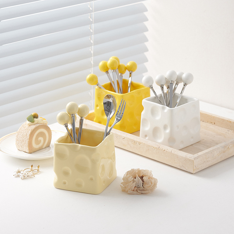 A new creamed, porcelain and fork cans of creative cheese and cans of cylindrical fruit fork.