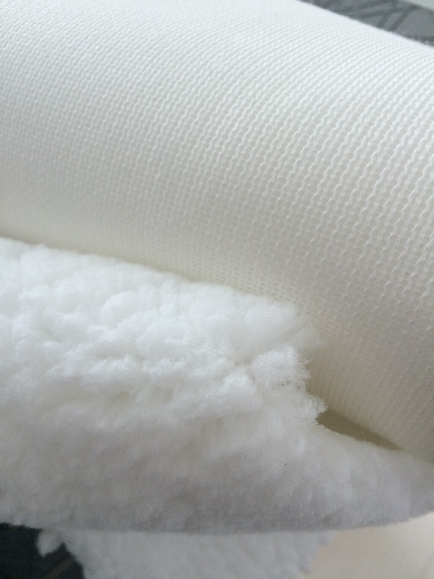 Blanche, industrial air filtering bags of furry fabric.