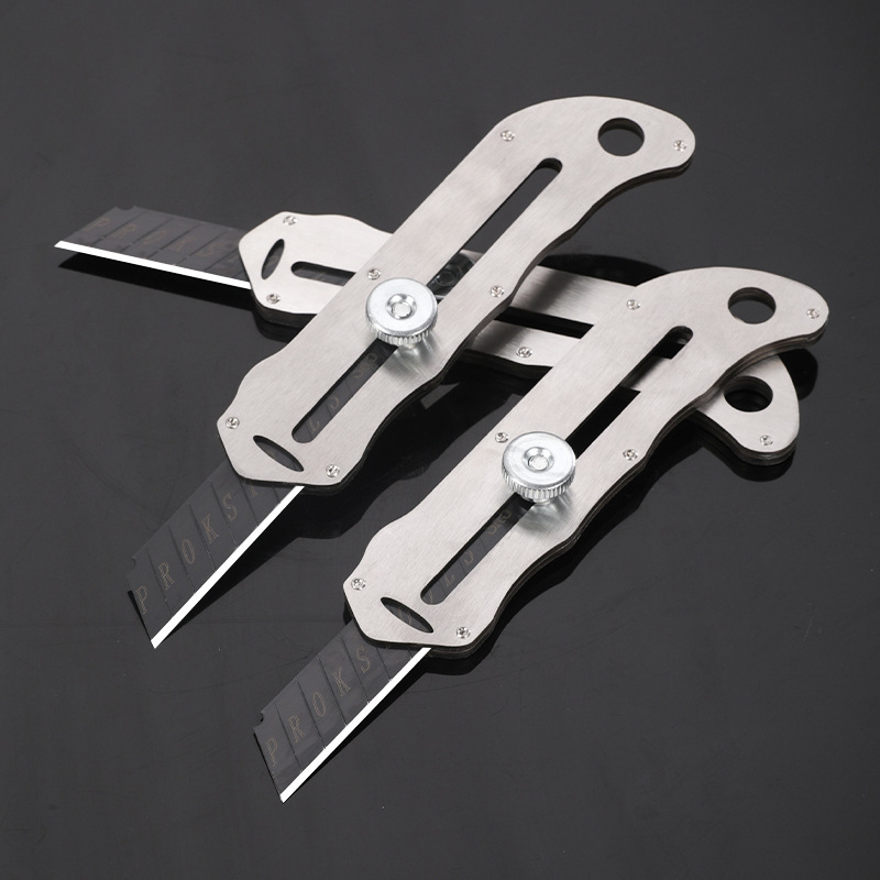 The stainless steel-worker's paper cutter, the aluminum alloyer's knife with a thick blade and a full metal stainless steel blade.