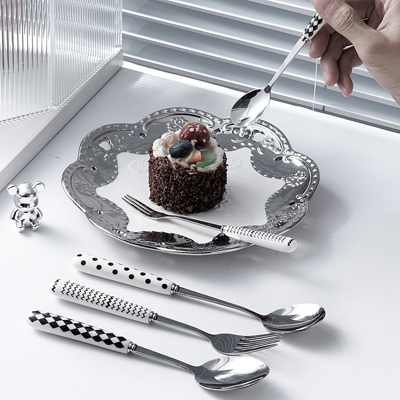 A simple pottery stainless steel steak knife and fork set of ins fork knife and creative fruit forkware.