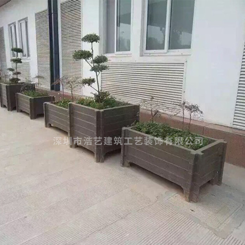 Shenzhen's Yong-ho artist supplies a concrete flower pot.