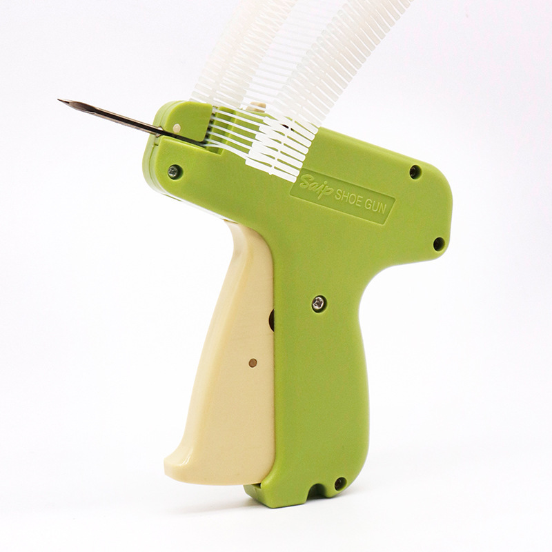 SAGA 60H, hand-held shoe nail pin gun, shoe-fixing gang, with a flat-head tip.