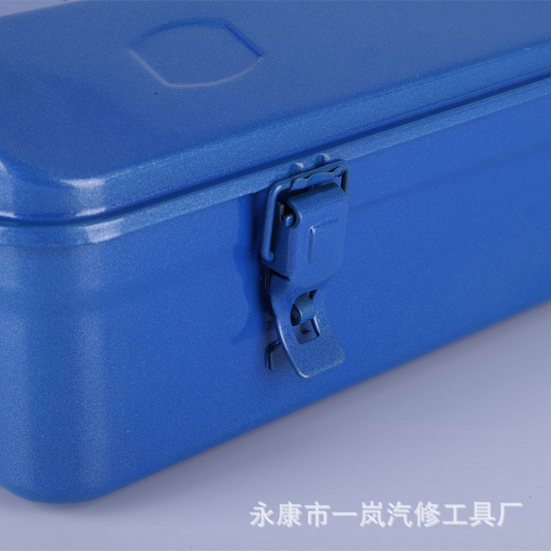 Hand-held iron-coated toolbox.