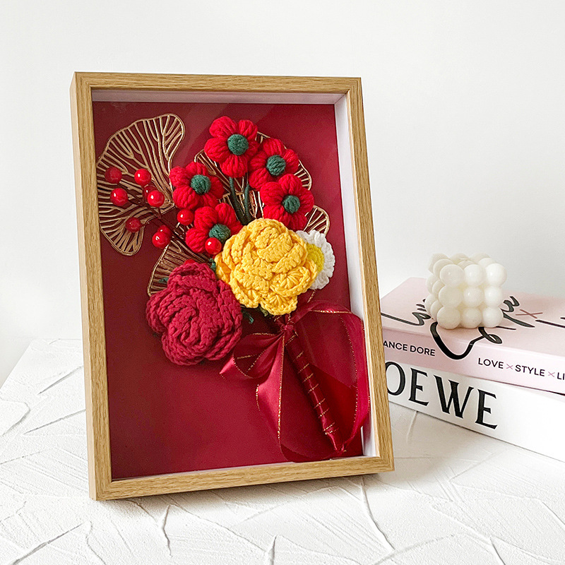 A hand-made crocheted bouquet of roses sends a girlfriend's birthday present to the sunflower home-made crochet flower.