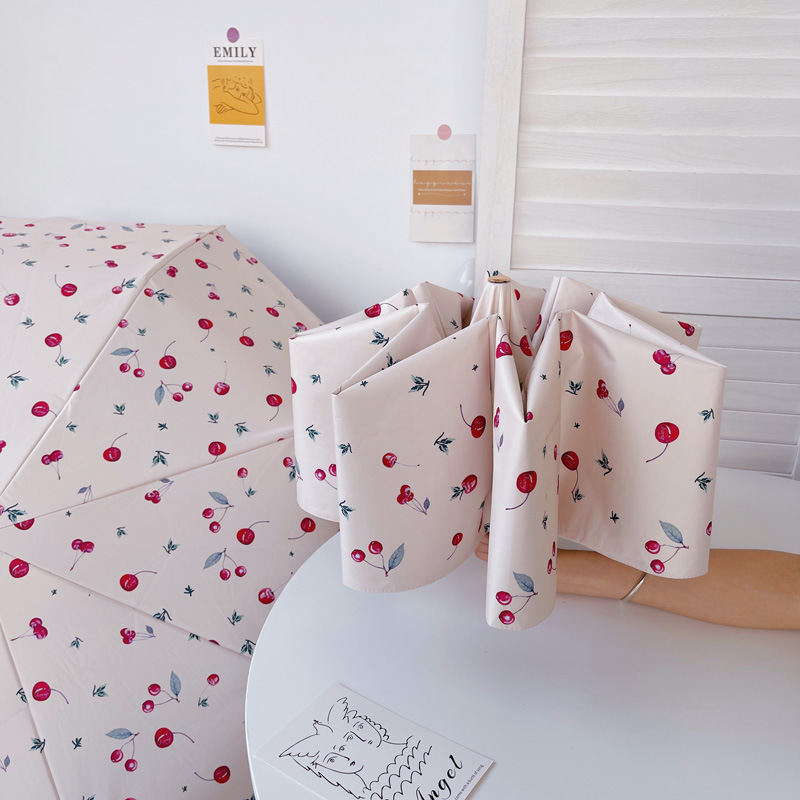 Máy đo bằng vàng Pháp được điều chỉnh bởi một chiếc dù của phụ nữ chống tia cực tím được bảo vệ.