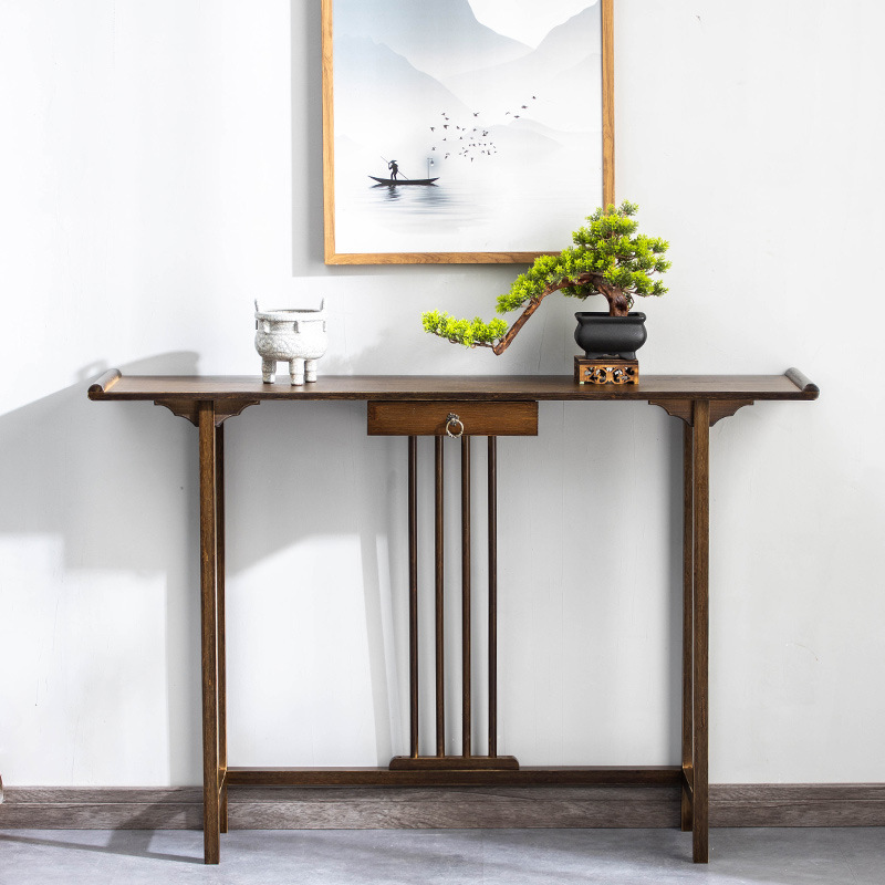 The new China-Kenkwan desk goes through the wall-knocking cabinet into a narrow section of the living room.