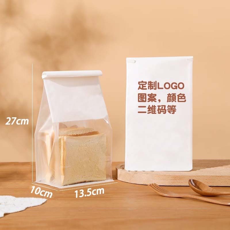 Open the window and open the white cow paper bag and seal the toast bag with a baked food seal.