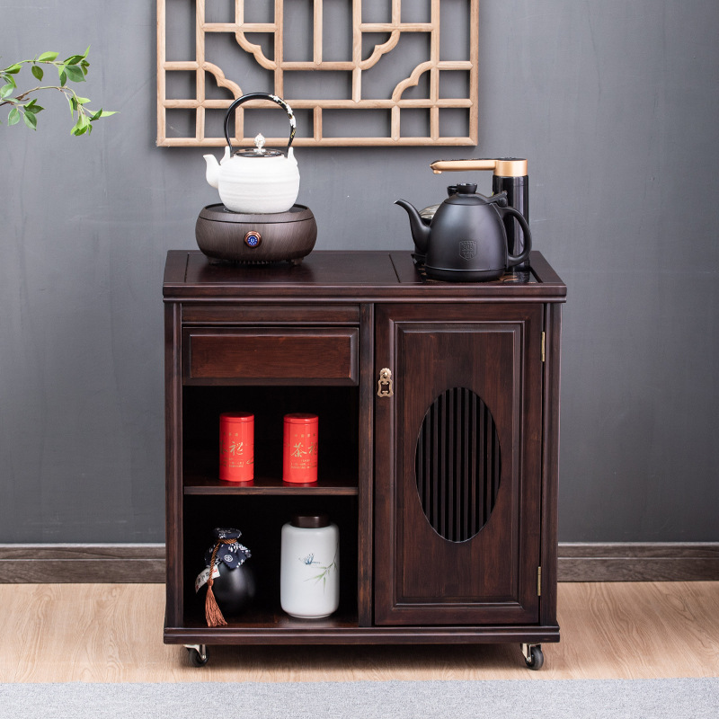 A tea cupboard with a new Chinese cupboard in the living room.