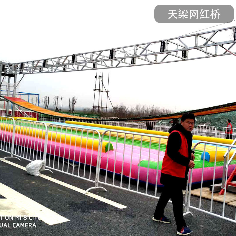 Henan's play equipment set up in the scenery.