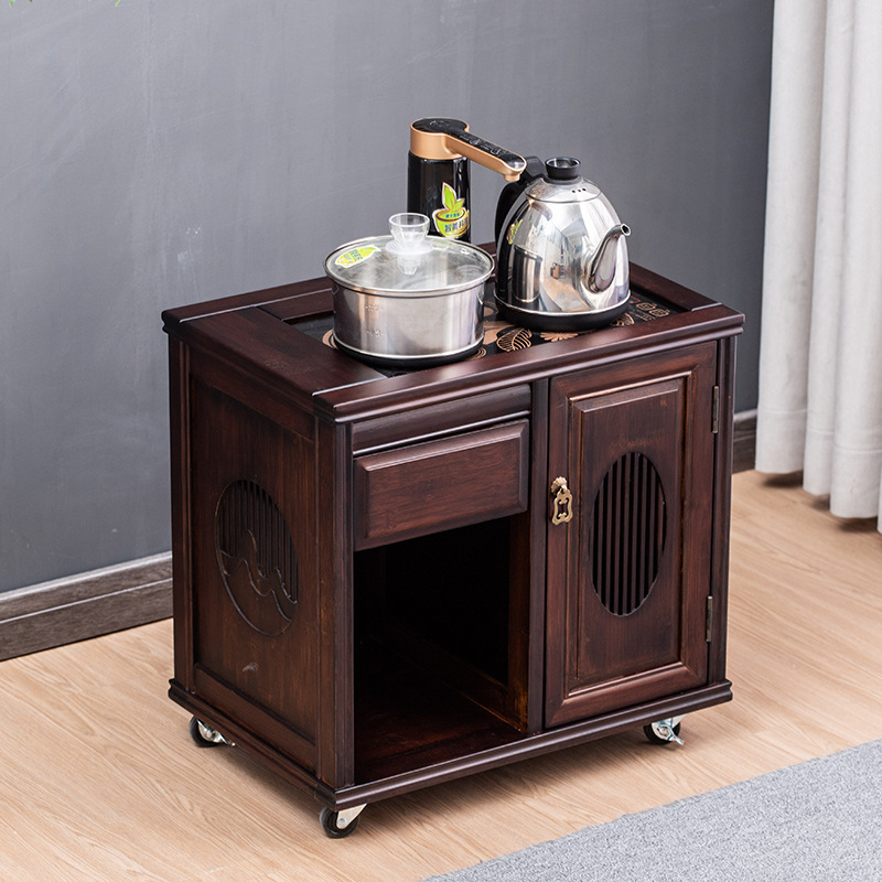 A tea cupboard with a new Chinese cupboard in the living room.