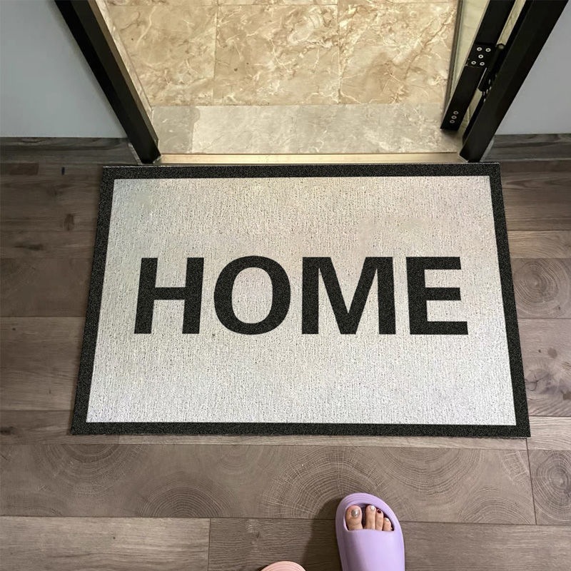 Red HOME black-and-white mats, home bathroom sliding pads, door scratching the sand-clad carpet.