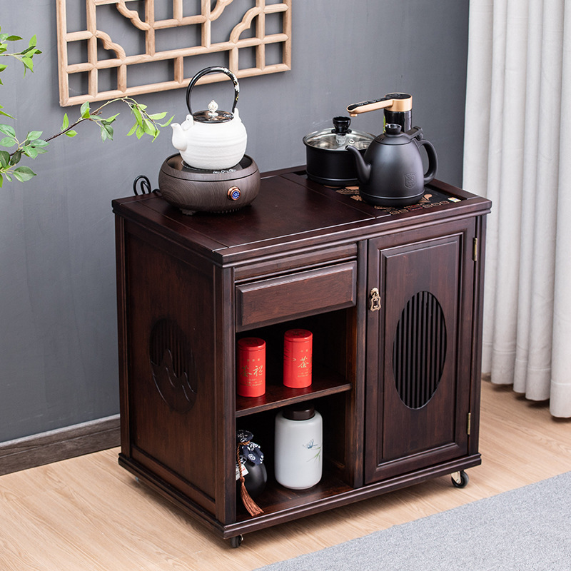 A tea cupboard with a new Chinese cupboard in the living room.