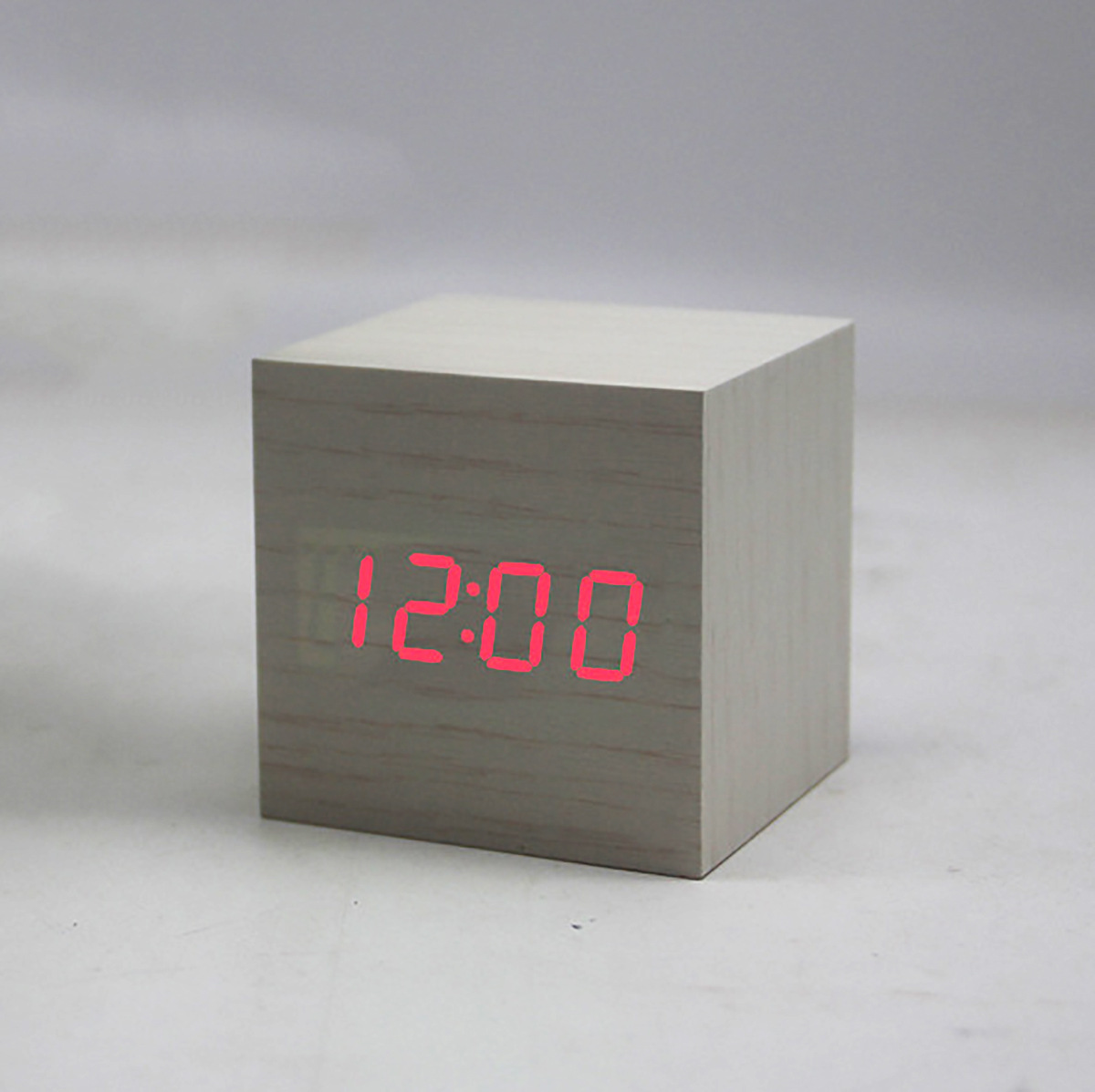 New wood, a fine square desktop alarm bell bedhead, a digital electronic clock, a surrogate.