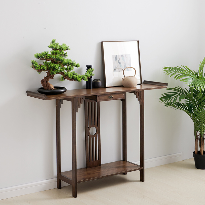 A table with a tea room line by the wall house.